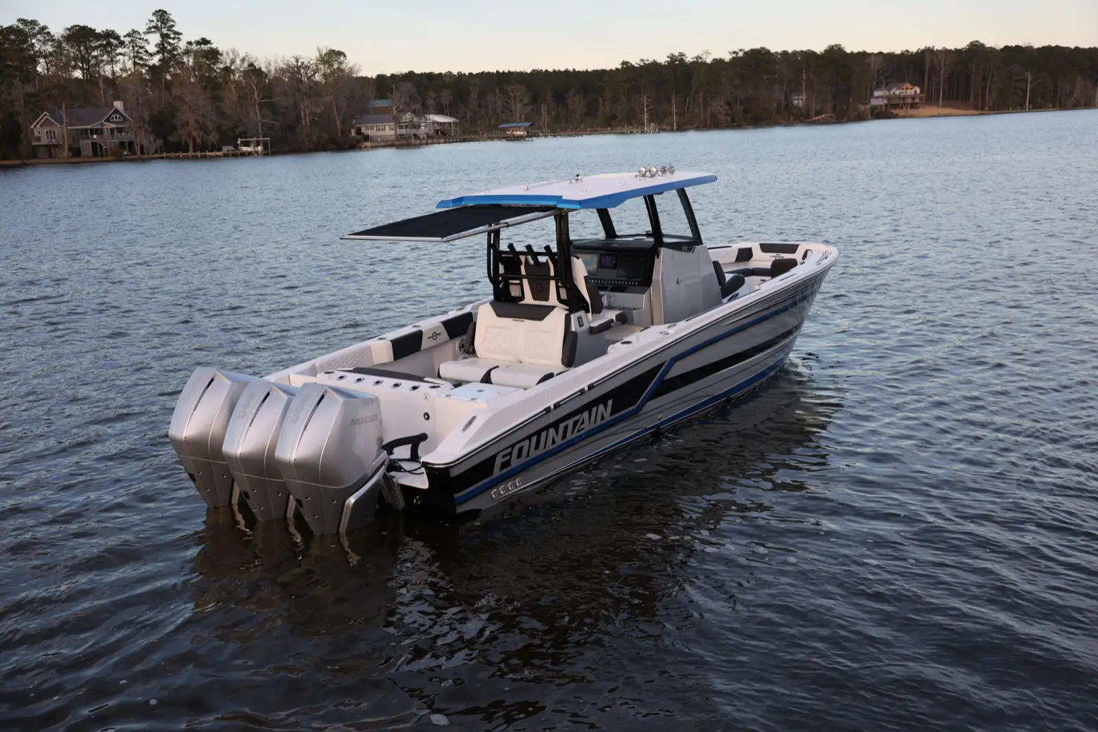 Fountain 33SCX with triple Mercury Racing outboards on the water