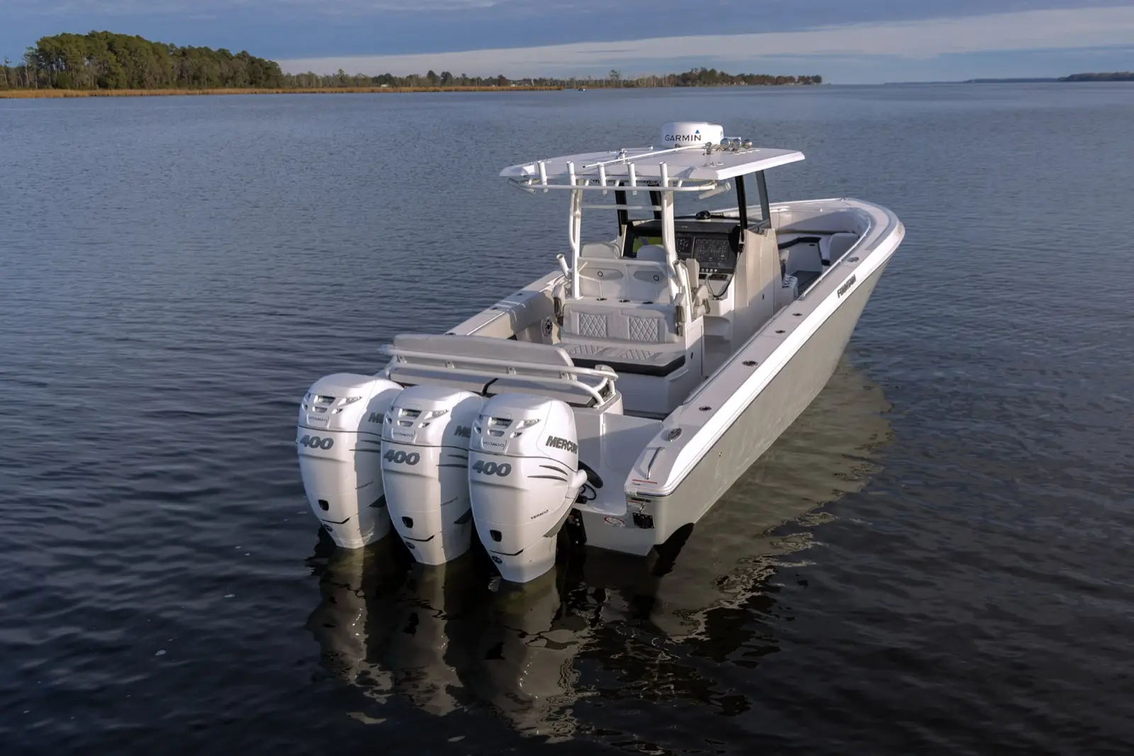 Fountain 39CC stern quarter with triple Mercury Racing outboards
